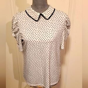 Peter Pan Collared shirt.